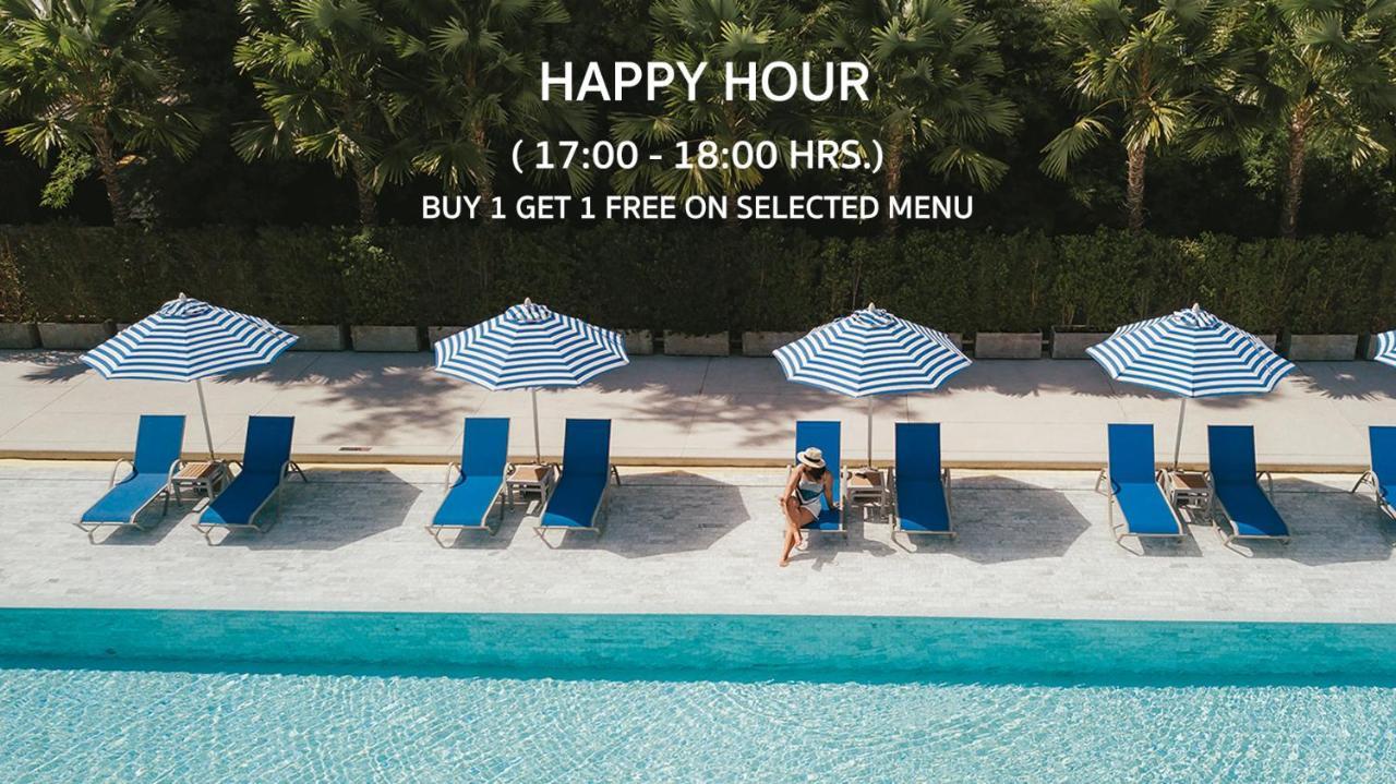 Seabed Grand Hotel Phuket - Sha Extra Plus Dış mekan fotoğraf Happy hour at a pool